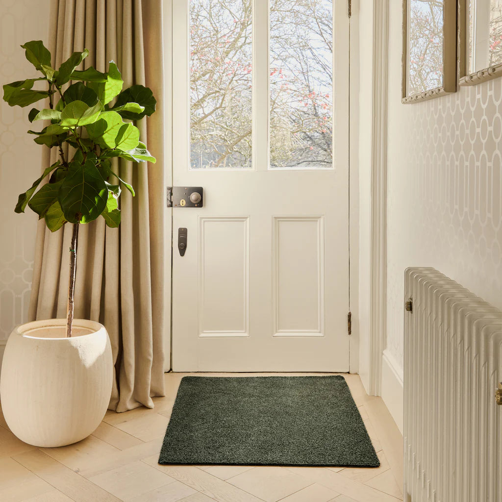 Hug Rug Sage Green washable doormat 50 x 75cm for trapping dirt and moisture at home entrances.