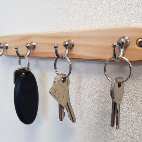 SMALL HOOK RAIL 4 CHROME HOOKS ON PINE BOARD