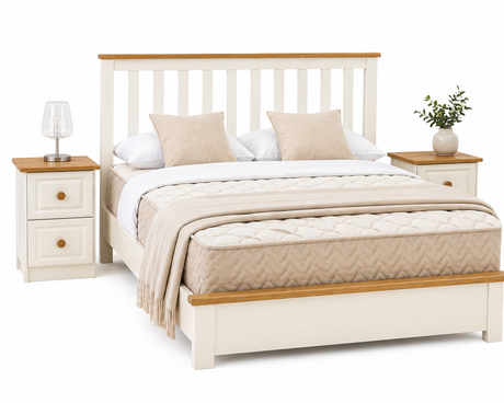 White bed with wooden accents and matching nightstands on a white background