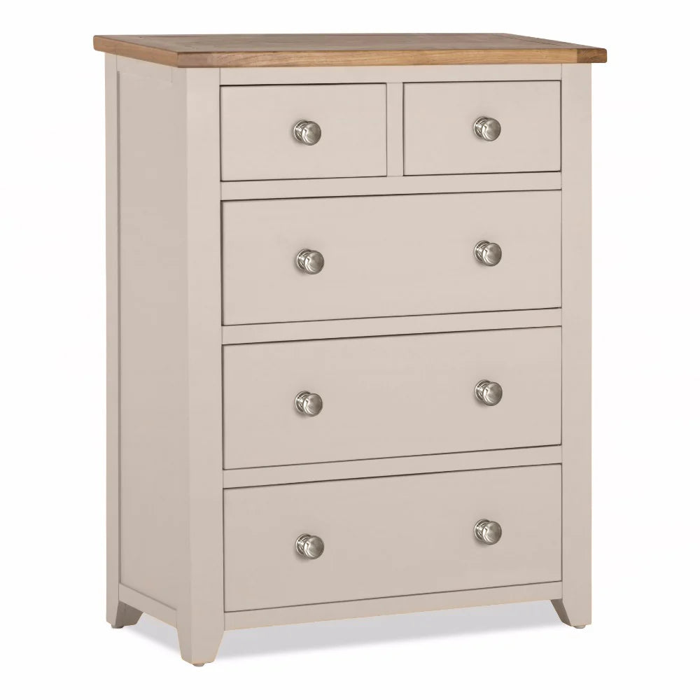 Beige chest of drawers with wooden top on a white background