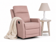 Pink recliner chair with a blanket and a side table with a lamp on a white background