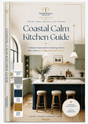 The front and spine of the book 'Coastal Calm Kitchen Guide' by Thornhill Brothers are shown against a clean white background. The cover features a photograph of a kitchen with sage green cabinets, a cream marble island, and a dark navy base, alongside color palette swatches.